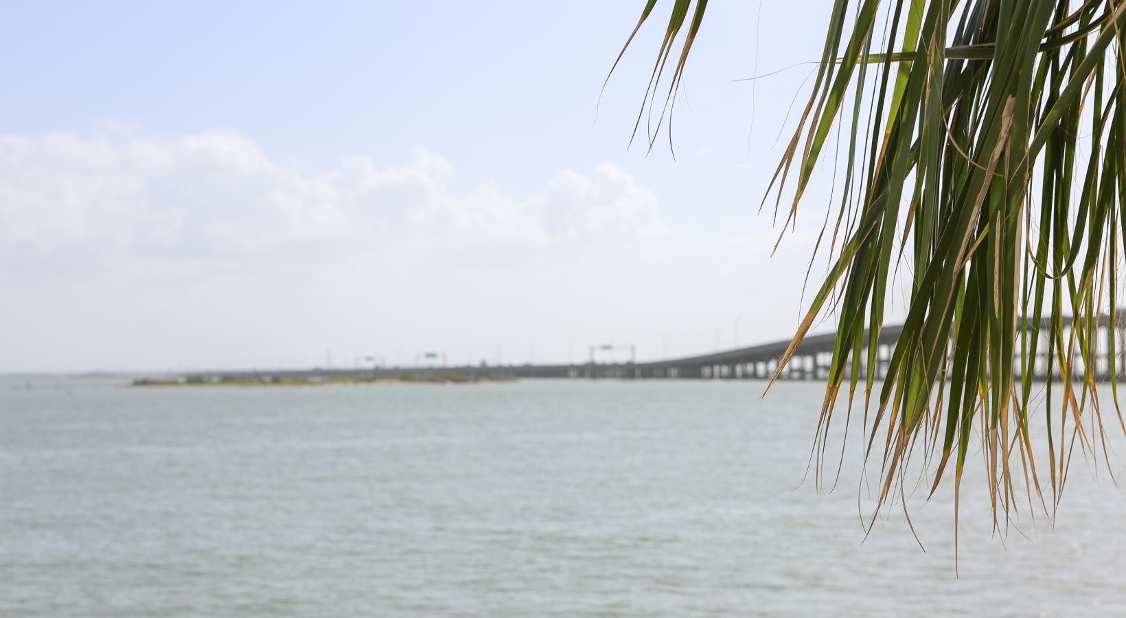 a body of water with a land in the distance