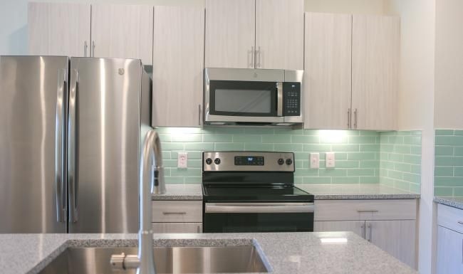 a kitchen with stainless steel appliances