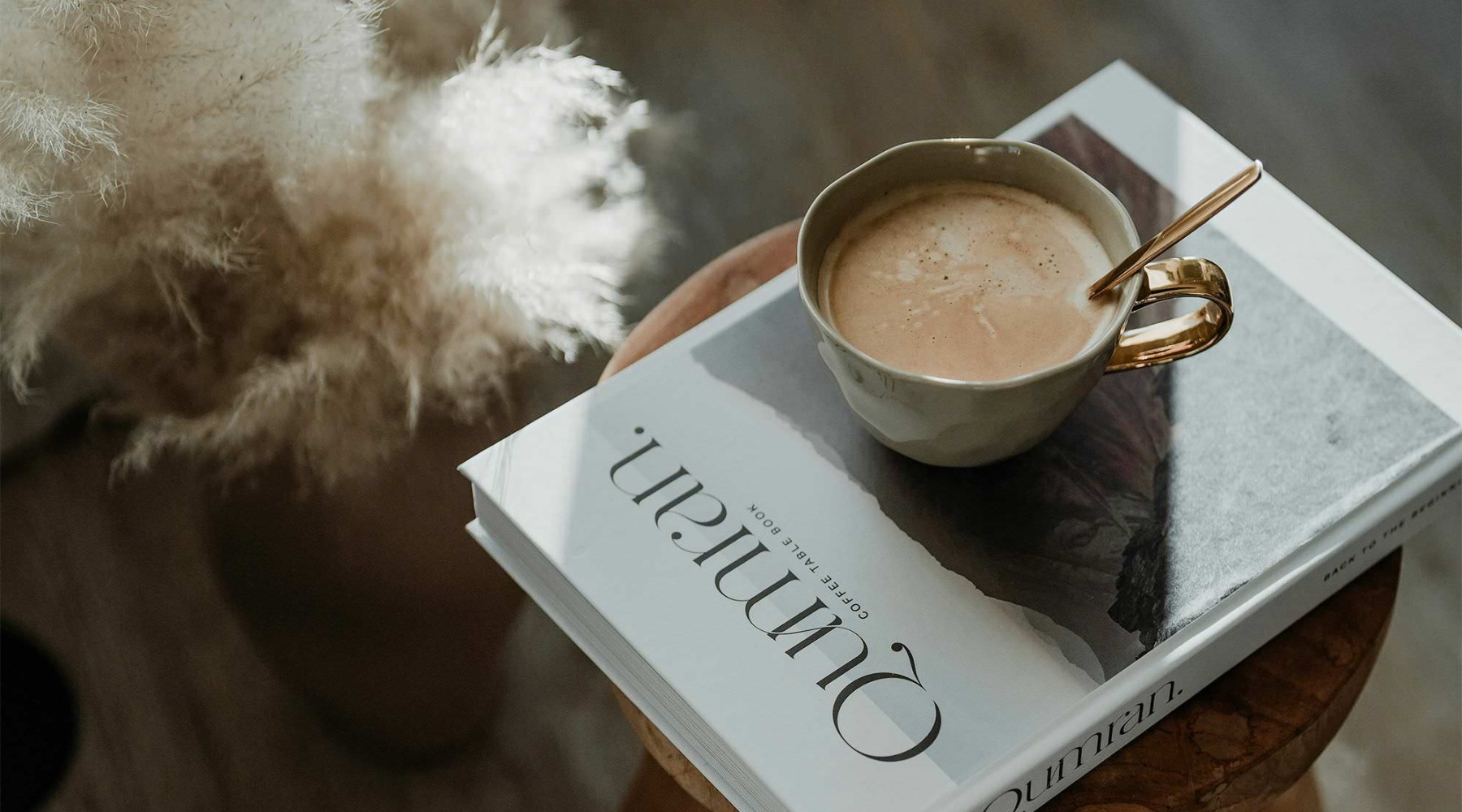a cup of coffee on a book